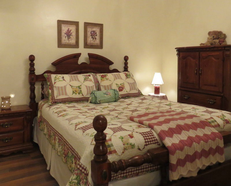 This is our PEI Bed and Breakfast loft Bedroom with Queen size bed.  It has a private balcony and an en-suite bath.
